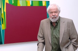 Karl Benjamin with Interlocking Forms (Big Magenta with Green) 1959 at Birth of the Cool exhibition opening in 2007_photo courtesy Louis Stern Fine Arts